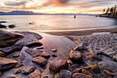 One of Lake Tahoe's 64 tributaries flows into the lake at sunset on the east shore, Nevada Lake Tahoe, Nevada, USA