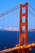 The Golden Gate Bridge at dusk with San Francisco in the background, California San Francisco, California, USA