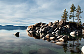 A calm and peaceful winter evening brings out the clarity of Lake Tahoe, Nevada Incline Village, Nevada, USA
