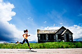 Female jogging in the country Jackson Hole, Wyoming, United States