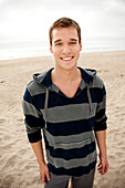 Portrait of a happy young male Cannon Beach, Oregon, USA