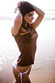 A young woman enjoys the beach Carlsbad, California, United States