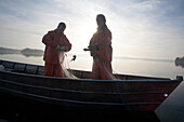 Inland fishermen on Lake Ploen in the morning, Ploen, Ostholstein, Schleswig-Holstein, Germany