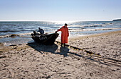 Fishermen on the beach, Baabe, Ruegen, Baltic Sea, Mecklenburg-Vorpommern, Germany