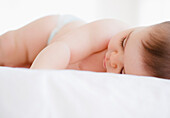 Mixed race baby boy sleeping, Jersey City, New Jersey, United States