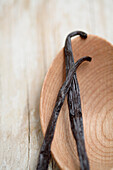 Close up of Mexican vanilla beans on wooden spoon, Santa Fe, New Mexico, United States