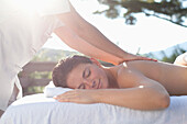 Woman having a massage, Stowe, Vermont, USA