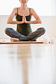 Brazilian woman practicing yoga, Jersey City, New Jersey, United States