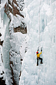 Caucasian man climbing ice, Ouray, Colorado, USA