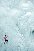 Caucasian man climbing ice, Ouray, Colorado, USA