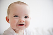 Smiling Caucasian baby girl, Jersey City, New Jersey, USA