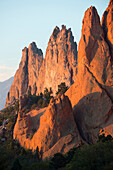 Red cliffs rising in rural landscape, Colorado Springs, Colorado, USA