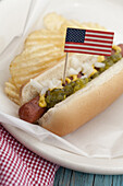 Close up of hot dog with American flag, Santa Fe, New Mexico, USA