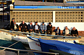 Men at quay, Puerto del Rosario, Fuerteventura, Canary Islands, Spain