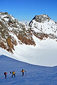 Three back-country skier ascending to Agglsspitze, Pflersch Valley, Stubai Alps, South Tyrol, Italy