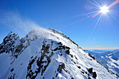 Snow drifting over summit of Agglsspitze, Pflersch valley, Stubai Alps, South Tyrol, Italy