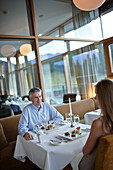 Couple in a hotel restaurant, Klais, Krun, Upper Bavaria, Germany