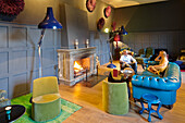 Guests sitting in parlor of a hotel, Klais, Krun, Upper Bavaria, Germany