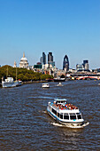 View over the Thames to St. Paul's Cathedral and the office highrisers of the City, London, England, United Kingdom