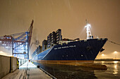 docking maneuver of the CMA CGM Marco Polo in the Container Terminal Burchardkai in Hamburg, Germany