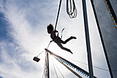 Girl in a bungee trampoline, La Paz, Baja California Sur, Mexico