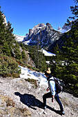 Hiking at Ciampac castle in Langen valley over Wolkenstein, Val Gardena, Groedner valley, Dolomites, South Tyrol, Italy