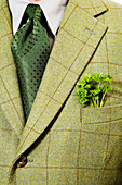 Green checked suit jacket with parsley in pocket