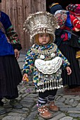 China ,Guizhou province , Langde village , Long Skirt Miao people in traditional dress , child.