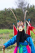 China , Guizhou province , Zhouguan village , DiXi, or Ground Opera, the living fossil of the Opera , in the fields.