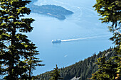 view from Mount Stachan near Vancouver, BC, with a ship on Howe Sound
