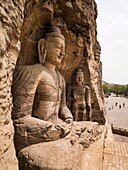 The Yungang Grottoes (Wuzhoushan Grottoes in ancient time) are ancient Chinese Buddhist temple grottoes near the city of Datong in the province of Shanxi. They are excellent examples of rock-cut architecture and one of the three most famous ancient Buddhi