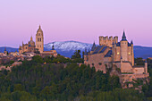 Alcazar fortress and cathedral at sunset, Segovia, Castilla-Leon, Spain.
