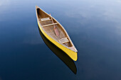 Yellow Canoe Floating On Smoke Lake, Algonquin Park, Ontario