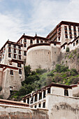 'Buildings on a hillside; China'