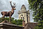 Roundabout of the cerf (stag) on the square place du chalet and renaissance bell tower of the old saint pierre church, senlis, oise (60), france