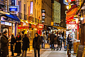 Lively nighttime bar ambiance, pub, bistro, greek restaurant, theatre, rue de la huchette, 5th arrondissement, paris at nght, france