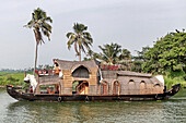 Houseboat in the the backwaters, ashtamudi lake near kollam, kerala, southern india, india, asia