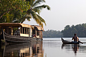 Houseboat in the backwaters, a network of lakes and lagoons, ashtamudi lake, kerala, southern india, india, asia