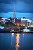 Old port of reykjavik with, in the background, the lutheran cathedral hallgrimskirkja, midnight sun, reykjavik, capital of iceland, southern iceland, europe