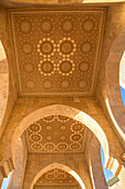 The vaulted arches of the hassan ii mosque partly erected over the sea in arab-andalusian tradition, casablanca, morocco, africa