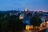 Elevated view of lower Old Town with Oleviste Church in the background, UNESCO World Heritage Site, Tallinn, Estonia, Europe