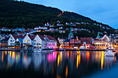 Bergen's picturesque Bryggen District illuminated at dusk, UNESCO World Heritage Site, Bergen, Hordaland, Norway, Scandinavia, Europe