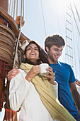 Caucasian couple on sailboat, Cape Town, Western Cape, South Africa