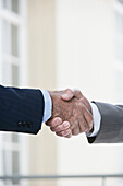 Caucasian businessmen shaking hands, Cape Town, Western Cape, South Africa