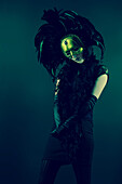 Girl in a black mysterious mask