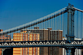 detail of the Manhattan Bridge and structures. building behind