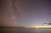 Iceland. Southern region. Skogar region. Holtsos lagoon. Twilight and Milky Way.