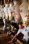 Traditional lamps hanging above the Stone of Anointing. Holy Sepulchre Church. Jerusalem. Israel.