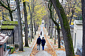 Paris, 20th arr., Père Lachaise cemetery. Walkers.