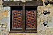 France, Lot et Garonne, Casteljaloux. Medieval window and old stone wall